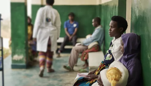 Young patients waiting outside hospital in Rwanda